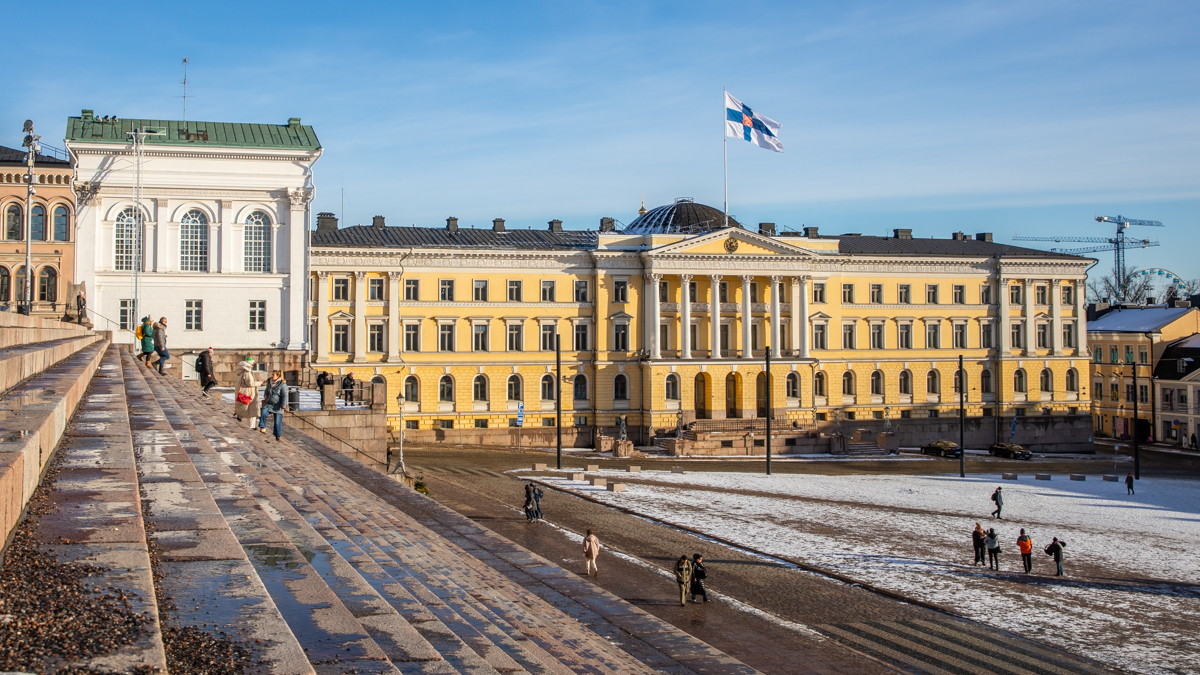 Government Palace in Helsinki with the Finnish flag hoisted